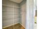 Walk-in pantry with wire shelving for organized storage at 2018 Misty Morning Dr, Winter Haven, FL 33880
