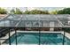 Outdoor pool with a screened enclosure featuring a clear view of the exterior at 2213 W Pilaklakaha Ave, Auburndale, FL 33823