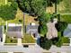 Aerial view of a home with a spacious backyard and well-kept landscaping at 2240 Country Manor St, Bartow, FL 33830