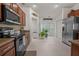 Well-equipped kitchen featuring stainless steel appliances, granite countertops, and ample cabinet space at 2240 Country Manor St, Bartow, FL 33830