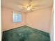 Bedroom with ceiling fan, window and neutral walls at 254 Winter Ridge Blvd # 254, Winter Haven, FL 33881