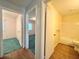 Hallway featuring doorways to bedroom and bathroom at 254 Winter Ridge Blvd # 254, Winter Haven, FL 33881