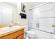 Bright bathroom with modern fixtures, shower-tub combo, and Mickey Mouse decor at 263 Reserve Dr, Davenport, FL 33896