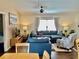 Inviting living room showcasing a comfortable sectional sofa and neutral decor at 263 Reserve Dr, Davenport, FL 33896