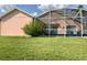Home exterior featuring a pool and a spacious lanai perfect for outdoor enjoyment at 263 Reserve Dr, Davenport, FL 33896