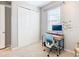 Bedroom with a window, desk, and closet, offering a workspace setup at 278 Alford Dr, Davenport, FL 33896