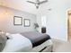 Bright bedroom offers neutral colors, stylish decor, and a tranquil retreat at 278 Alford Dr, Davenport, FL 33896