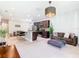 Spacious living area adjacent to kitchen, featuring modern decor and an open floor plan at 278 Alford Dr, Davenport, FL 33896