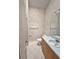 Compact bathroom featuring a neutral-color palette, tiled floors, and a vanity with a sink at 2909 Pine Tree Dr, Edgewater, FL 32141