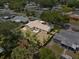 Aerial view showcasing the property's backyard, and the surrounding residential neighborhood at 320 Boger S Blvd, Lakeland, FL 33803