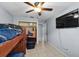 Bedroom with a ceiling fan, bunk beds, and a closet for storage at 320 Boger S Blvd, Lakeland, FL 33803