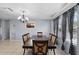 Dining room featuring a modern chandelier and tile flooring at 320 Boger S Blvd, Lakeland, FL 33803
