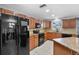 Modern kitchen with stainless steel appliances, granite countertops, and ample cabinet space at 320 Boger S Blvd, Lakeland, FL 33803