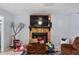 Living area with stone fireplace and bright natural light at 320 Boger S Blvd, Lakeland, FL 33803