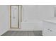 The bathroom features tub, and shower at 327 Cloverdale Rd, Winter Haven, FL 33884