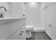 Well-lit bathroom featuring white cabinets, granite countertops, and walk-in shower at 327 Cloverdale Rd, Winter Haven, FL 33884