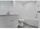 Well-maintained bathroom featuring a vanity, toilet, and a bathtub-shower combination at 327 Cloverdale Rd, Winter Haven, FL 33884