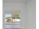 Outdoor patio area, as seen through sliding glass doors, providing a seamless transition between indoor and outdoor living at 327 Cloverdale Rd, Winter Haven, FL 33884