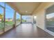 Enclosed patio with access to backyard provides additional outdoor living space at 327 Cloverdale Rd, Winter Haven, FL 33884