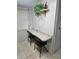 Small, functional home office area with granite desktop and natural light at 333 Lake Howard Nw Dr # 312D, Winter Haven, FL 33880