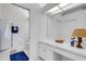 Bright bathroom with ample counter space, vanity, walk-in shower and updated fixtures at 351 Enclave Dr # 94, Lakeland, FL 33803