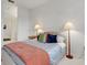 Calm bedroom featuring soft natural light and a plush bed with stylish pillows at 351 Enclave Dr # 94, Lakeland, FL 33803