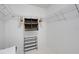 Walk-in closet with installed wire shelving and shoe rack, providing storage at 351 Enclave Dr # 94, Lakeland, FL 33803
