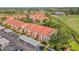 Scenic exterior of the condo building overlooking the lush golf course at 351 Enclave Dr # 94, Lakeland, FL 33803