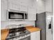 Modern kitchen equipped with stainless steel appliances and plenty of cabinet space at 351 Enclave Dr # 94, Lakeland, FL 33803