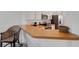 Bright kitchen featuring a breakfast bar with wooden countertop at 351 Enclave Dr # 94, Lakeland, FL 33803