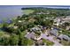 Aerial view of a waterfront home featuring a large lot, and lush green trees at 3705 Pine Cir, Lake Wales, FL 33898