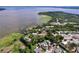 Aerial view of a scenic waterfront property boasting lake access, lush greenery, and tranquil surroundings at 3705 Pine Cir, Lake Wales, FL 33898