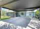 View of the large carport, offering ample parking and protection from the elements at 3705 Pine Cir, Lake Wales, FL 33898