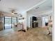 Dining area featuring a table with chairs, a sliding glass door, leading to the outdoor patio, and modern furnishings at 3705 Pine Cir, Lake Wales, FL 33898
