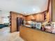 Modern kitchen with stainless steel appliances and eat-in counter at 3705 Pine Cir, Lake Wales, FL 33898