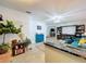 Open-concept living room featuring stylish decor and natural light at 3705 Pine Cir, Lake Wales, FL 33898