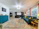 Comfortable living room with a stylish rug and entertainment center at 3705 Pine Cir, Lake Wales, FL 33898
