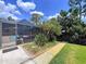 Enclosed screened in lanai and pool area at 3705 Pine Cir, Lake Wales, FL 33898