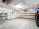 Spacious garage with ample storage, showcasing its functional design and potential at 380 Niblick Cir, Winter Haven, FL 33881