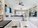 Kitchen sink with view of the open floor plan at 380 Niblick Cir, Winter Haven, FL 33881