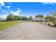 Enjoy the community pool with an adjacent building and plenty of parking at 40 Westridge Rd, Davenport, FL 33837