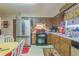 Functional kitchen with stainless steel refrigerator, updated appliances and ample cabinet space at 40 Westridge Rd, Davenport, FL 33837
