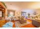 Inviting living room with plush sofas, decorative pillows, and rustic-chic coffee table at 40 Westridge Rd, Davenport, FL 33837