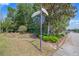 Street sign for Ridgewood Lakes Blvd and West Ridge, surrounded by lush greenery at 40 Westridge Rd, Davenport, FL 33837