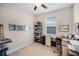 Bright office space with light wood floors and a large window at 4100 Martindale Loop, Winter Haven, FL 33884