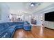 Open-concept living space with modern kitchen and dining area, perfect for entertaining and everyday living at 413 Ruby Lake Pl, Winter Haven, FL 33884