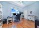 A home office offers a work-from-home space with natural light and plenty of room for office equipment at 413 Ruby Lake Pl, Winter Haven, FL 33884