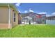 Spacious backyard with a pool area, offering privacy and lots of room for outdoor fun at 421 Riders Loop, Auburndale, FL 33823