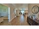 Spacious living room featuring wood floors and contemporary furnishings, ideal for relaxation and entertainment at 421 Riders Loop, Auburndale, FL 33823
