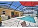 Enjoy this gorgeous screened pool with a spacious deck, perfect for outdoor entertaining at 421 Riders Loop, Auburndale, FL 33823